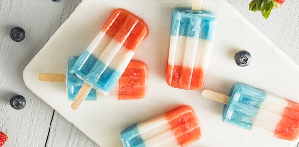 Red, white, and blue themes popsicles on a plate