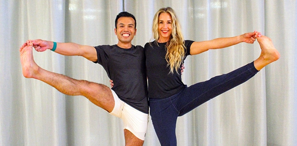 2 Yoga instructors doing a pose together