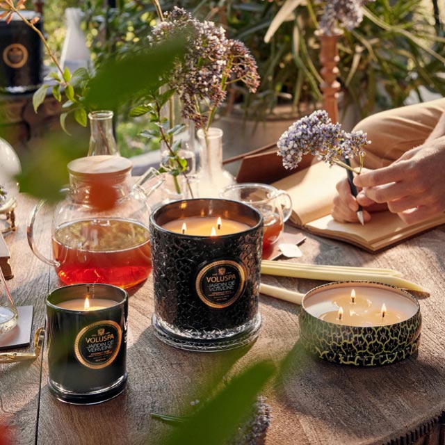 A selection of Voluspa candles on a table