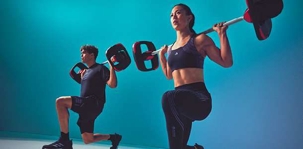 Two people in a BODYPUMP class at the Les Mills New Year’s Launch Party!