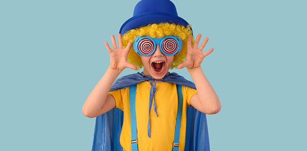 A boy dressed up for the Carnival themed Parents' Escape Date Night