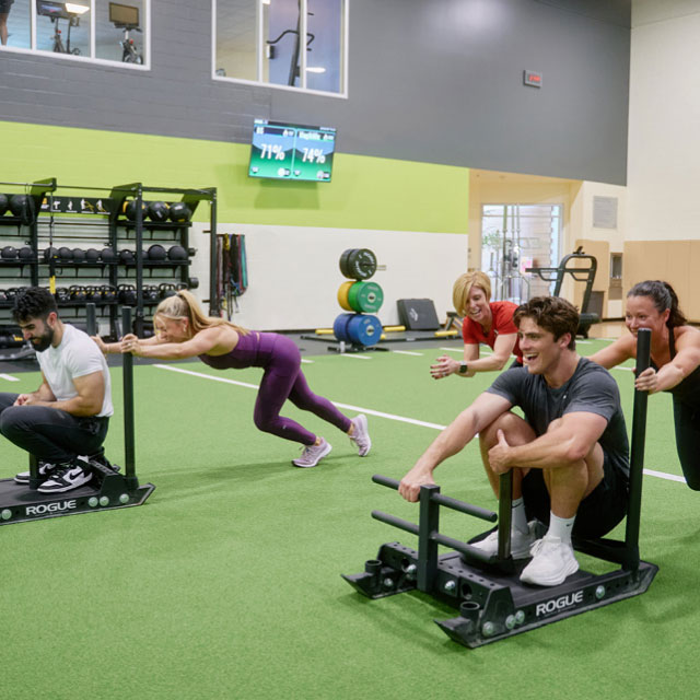 A group of friends working out and laughing at ClubSport