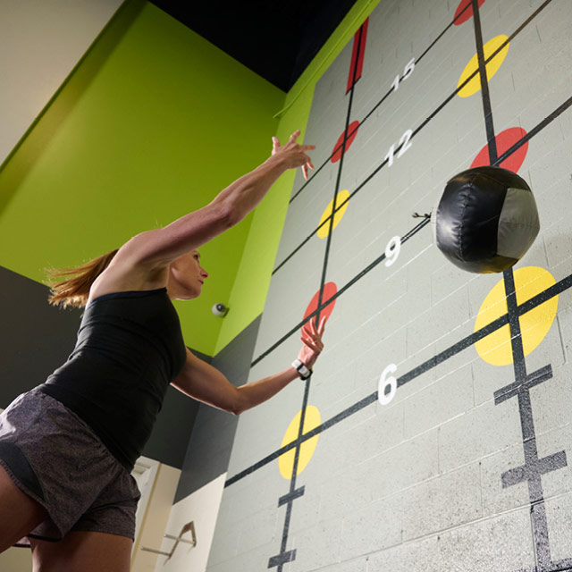A woman training on The Edge Functional Training Zone