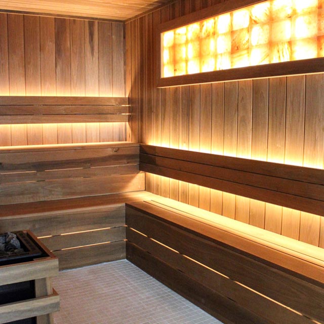 Women's private sauna with pink Himalayan salt wall